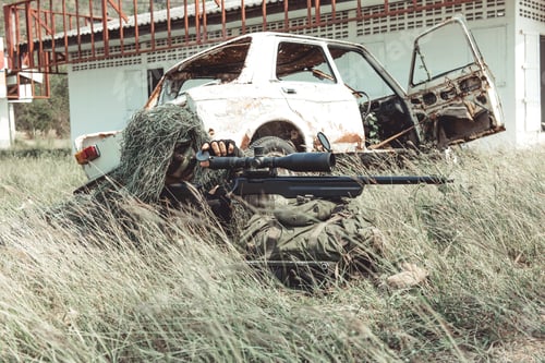 Preview: Sniper In Urban Combat Training. Full Ghillie Camo Suit And A High Power Sniper Rifle. In Urban