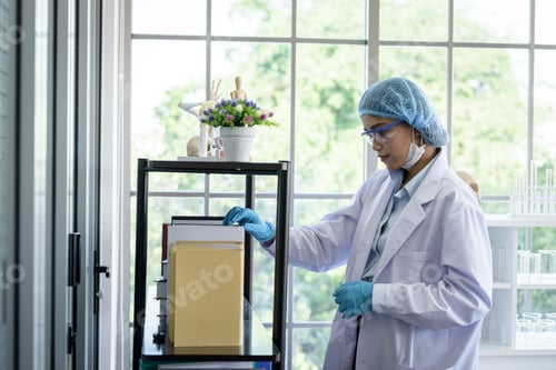 Preview: Asian Young Girl Student Scientist Researching And Learning In A Laboratory.