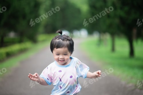 Preview: Cute Baby Running In The Garden