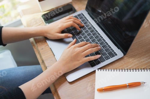 Preview: Young Women Working With Laptop On The Wood Table In The Cafe, Business Concept