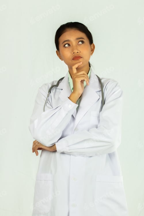 Preview: Closeup Portrait On Asian Medicine Doctor Woman Isolated White Background.Woman Thinking Action