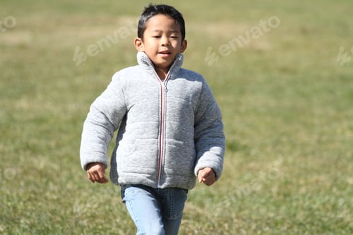 Preview: Japanese Boy Running On The Grass (First Grade At Elementary School)