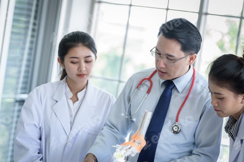 Preview: Asian Teacher Has Teaching To Student About Science And Anatomical In Laboratory