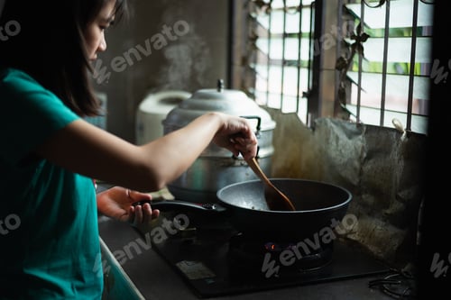 Preview: Women Cooking Fried Vegetables In The Kitchen
