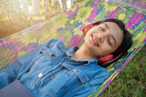 Preview: Happy Young Asian Girl Spend Time In The Garden At Home.