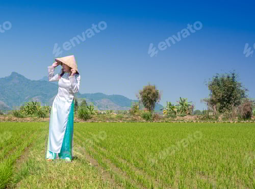 Preview: Vietnamese Woman In White National Costume Dress ( Cheongsam Dress) And Asian Conical Hat Stand In