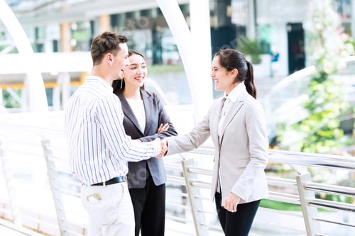 Preview: Friendly Business Meeting Concept. Outdoor Business Meeting With Two Beautiful Women And White Male