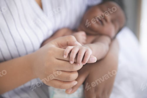Preview: Close Up Mother Holding Hands Newborn Baby In A Room With A Lot Of Sunlight, Newborn Baby Sleeping
