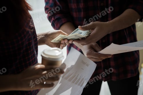 Preview: A Group Of People Working Man And Woman In The Plaid Shirt Talking/Consulting/Idea About Doing