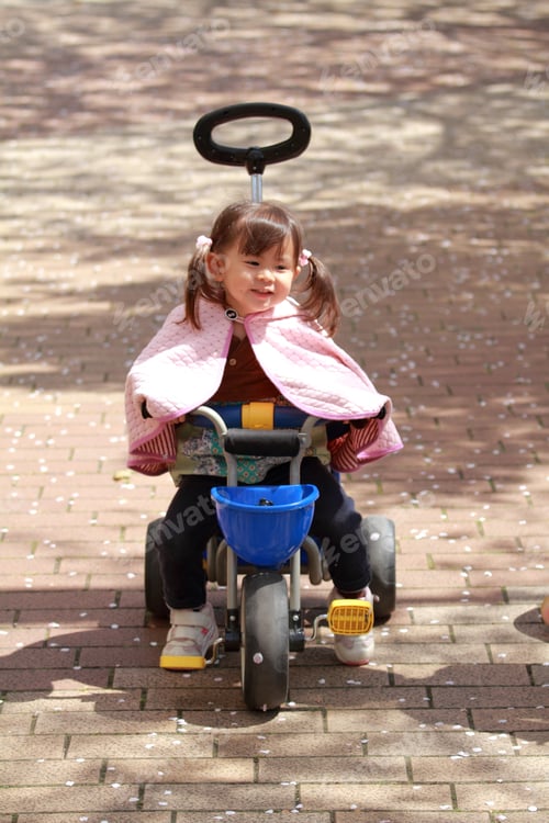 Preview: Japanese Girl Riding On The Tricycle (2 Years Old)
