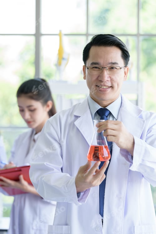 Preview: Asian Senior Laboratory Scientist Man Working At Lab With Asian Young Student Scientist Backgroud.
