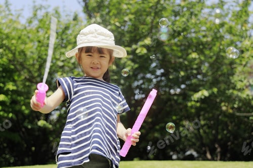 Preview: Japanese Girl Playing With Bubble Under The Blue Sky (4 Years Old)