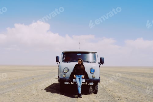 Preview: Asia Woman Wear Jean At Gobi Desert Mongolian With Goat And Sheep Background And Nice Sky At