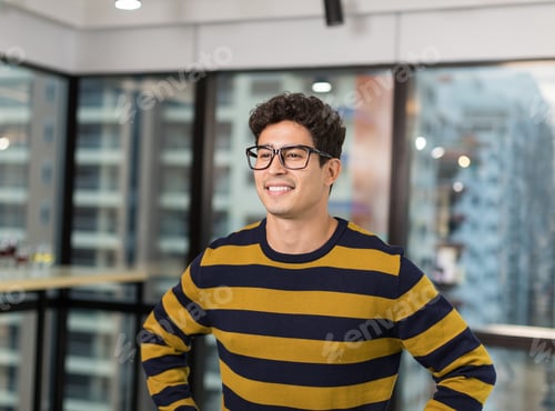 Preview: Confident Smiling Young Man Wearing Sweater Casual Clothes And Glasses In The Modern Office