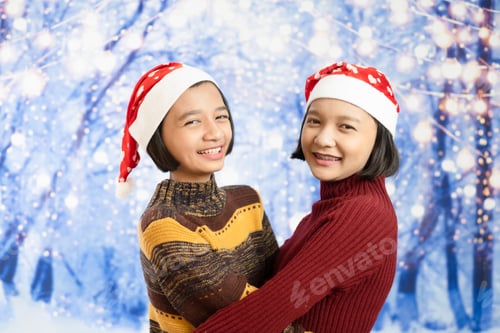 Preview: Two Happy Young Girl With Snow Background.