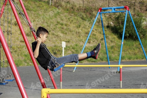 Preview: Japanese Boy On The Swing (Fourth Grade At Elementary School)
