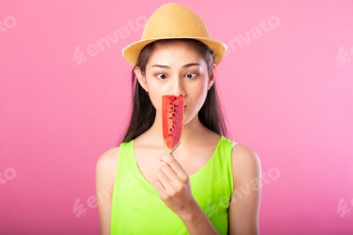 Preview: Portrait Of A Happy Attractive Woman In Summer Green Outfit With Hat Holding Fresh Water Melon On