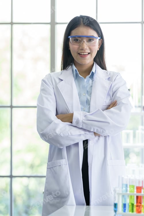 Preview: Asian Young Girl Student Scientist Researching And Learning In A Laboratory.
