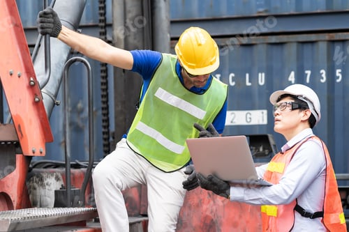 Preview: Team Of Foreman Supervisor Worker In Uniform And Wearing Safety Helmet Using Laptop Computer