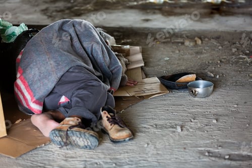 Preview: Homeless Man Sleeping In An Abandoned Building Or On Street In City