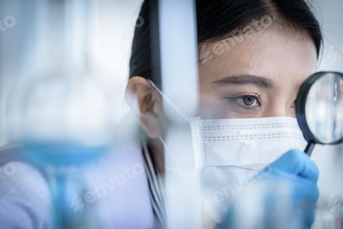 Preview: Asian Young Girl Student Scientist Researching And Learning In A Laboratory.