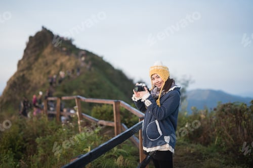 Preview: Asia Girl Take Photo At Mountain In The Morning