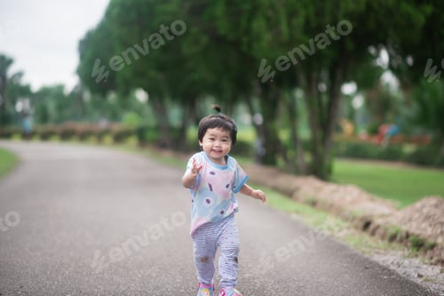 Preview: Cute Baby Running In The Garden