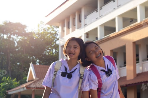 Preview: Portrait Young Asian Girl At School With Uniform.