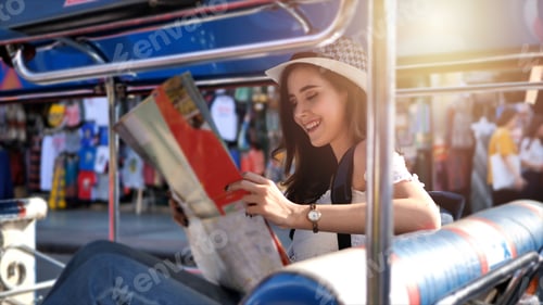 Preview: Cheerful Woman Wanderer With Trendy Look Searching Direction On Location Map In City Centre On