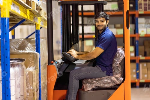 Preview: Male Warehouse Worker Driving And Operating On Forklift Truck For Transfer Products Or Parcel Goods