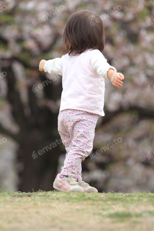 Preview: Japanese Girl Walking On The Grass (1 Year Old)