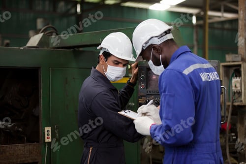 Preview: Group Of Male Engineer Worker Wearing Face Mask Working At Factory. Team Of Male Technician Worker