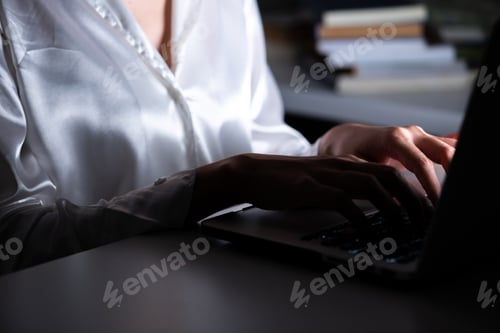 Preview: Woman Working Late At Her Home Office. Beautiful Asian Woman Typing On Kyboard At Night. Modern