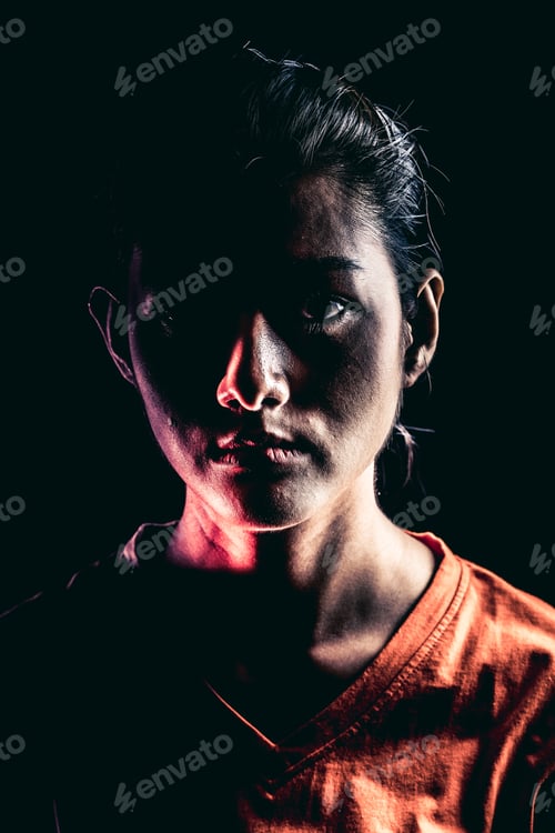Preview: Halloween Zombie Girl Portrait. Asian Woman In Orange T-Shirt, Dramatic Lighting. For Scary