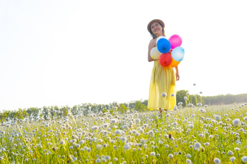 Preview: Beautiful Girl Standing At Beautiful Parlk With Balloons And Copy Space.