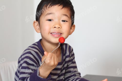 Preview: Japanese Boy Eating Strawberry