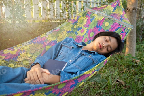 Preview: Happy Young Asian Girl Spend Time In The Garden At Home.