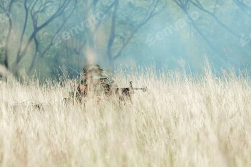Preview: Soldier Hiding In Bushes Ready To Shoot. Ambush His Ememy, Ready His Assault Rifle. Hiding Below