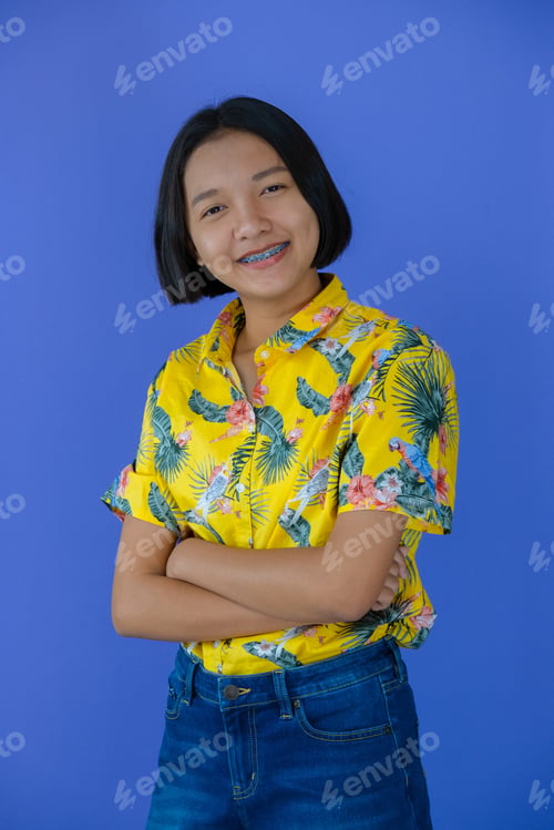 Preview: Happy Young Girl With Blue Background.