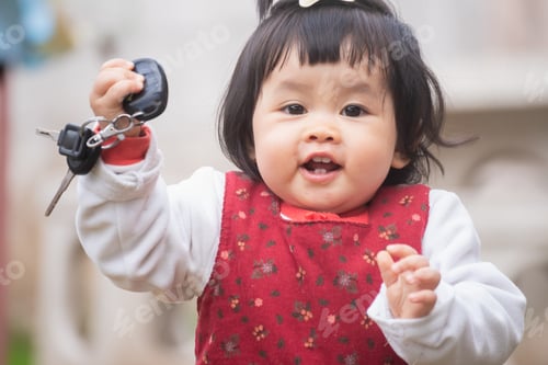 Preview: Portrait Of Cute Baby Playing On The Lawn