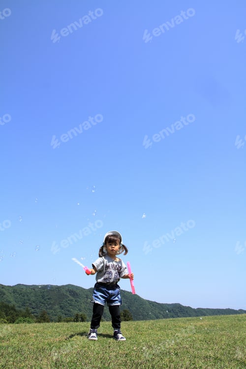 Preview: Japanese Girl Playing With Bubble Under The Blue Sky (3 Years Old)