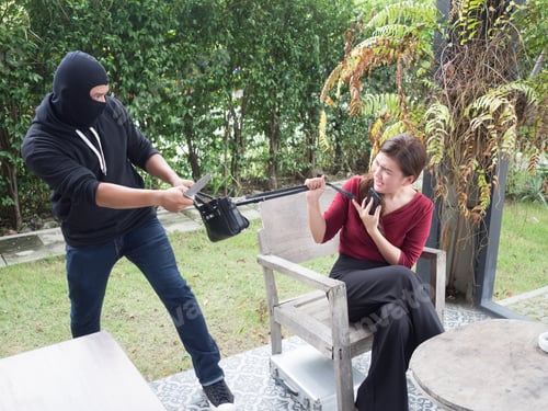 Preview: Bandit For Crime.The Mask Is Bandit To Rob The Woman Talking On The Phone.