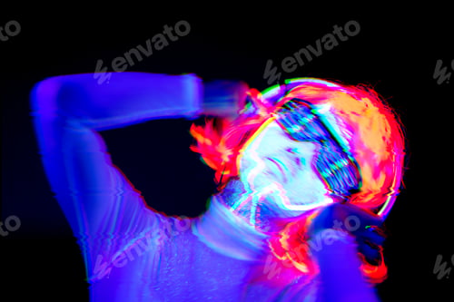 Preview: Abstract Blur Of Beautiful Sexy Woman With Cyborg Uv Face Paint, Wig, Glowing Glasses, Glowing