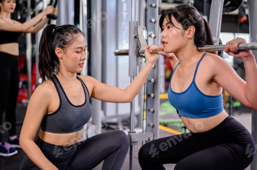 Preview: Asian Woman Exercise And Lifestyle At Fitness Gym. Sporty Woman Workout With Trainer. Wellness And