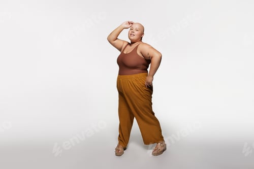 Preview: Confident Woman Posing in Relaxed Style Clothing