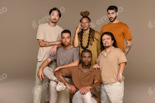 Preview: Studio Portrait Of Six Models With Diverse Ethnicities Posed Confidently On A Neutral Background