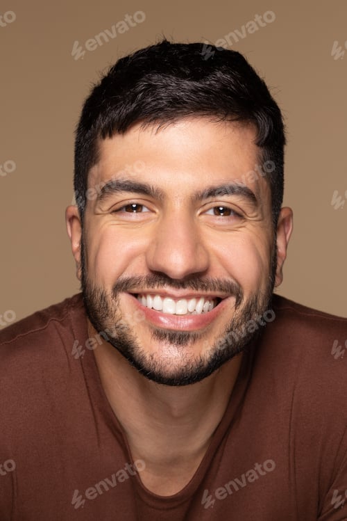 Preview: Portrait Of Attractive Hispanic Man In His 30S Posing Confidently On Neutral Background