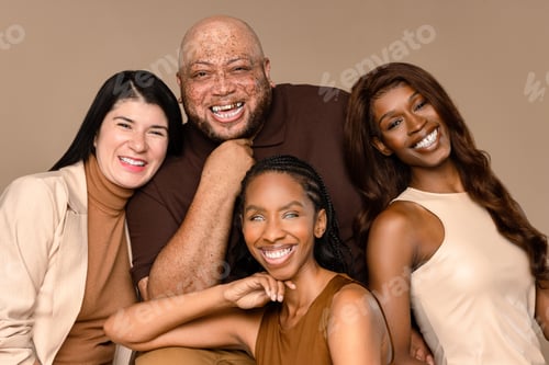 Preview: Portrait Shot Of A Group Of Beautiful Multiracial People Smiling Together On A Neutral Background.