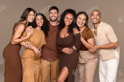 Preview: Portrait Of A Group Of Beautiful Multiracial People Smiling Together On A Neutral Background.