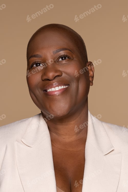 Preview: Smiling Woman in White Blazer Posing in Studio